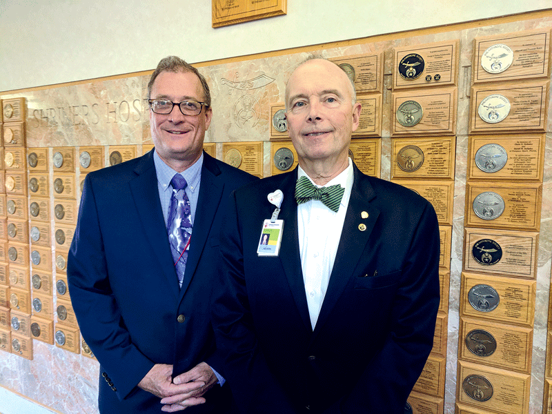George Gorton, director of Research, Planning, and Business Development (left), and Administrator H. Lee Kirk Jr.