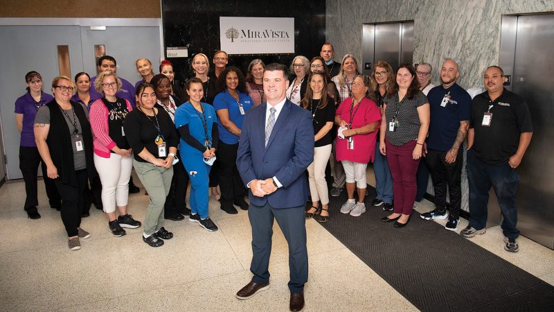 Mark Paglia, seen here with several team members at MiraVista Behavioral Health Center
