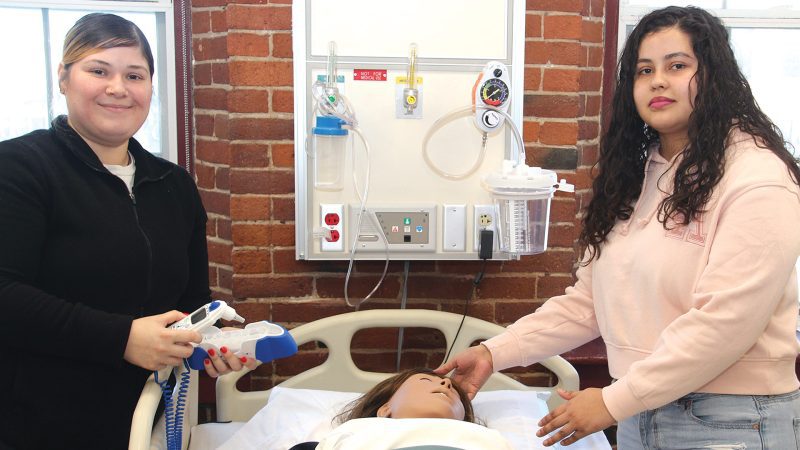 CNA students Marianna Navarro Santiago, left, and Dashira Nazario