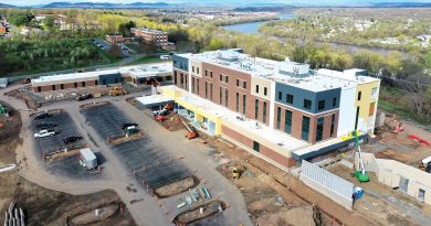 The new hospital, seen here in the late stages of construction, will open in August.
