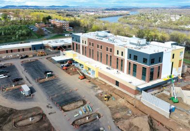 The new hospital, seen here in the late stages of construction, will open in August.
